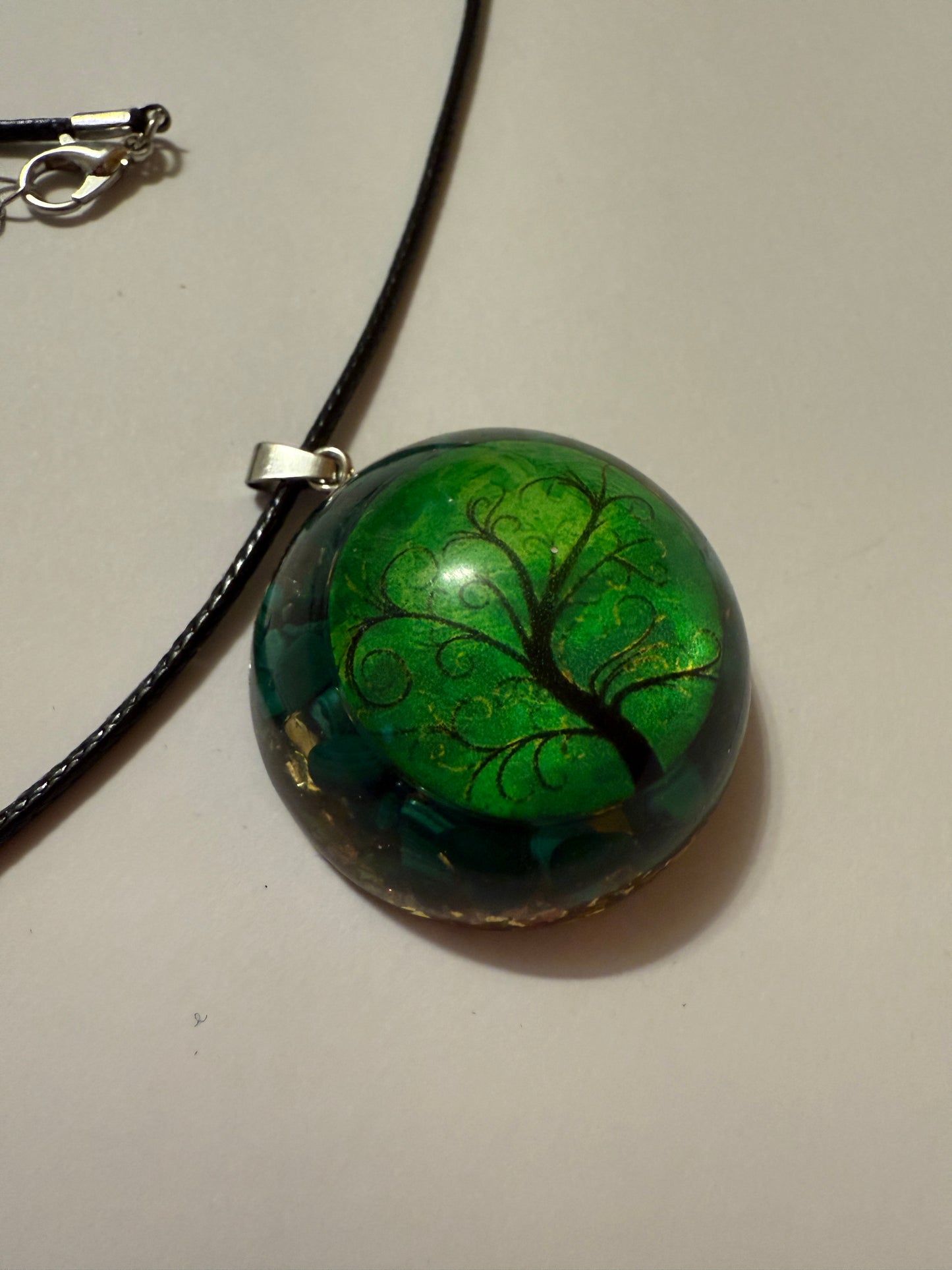 Handmade malachite orgone pendant with tree of life motif
