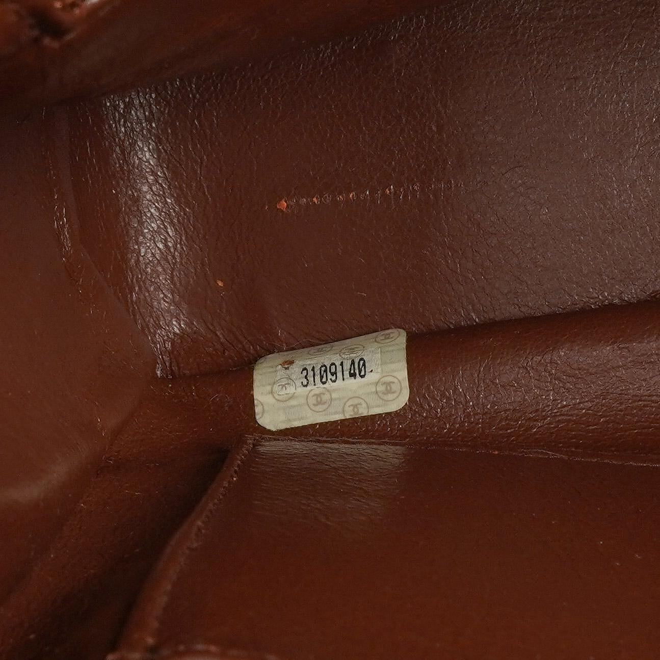 Chanel Medium Kamera Quaste Braune Vertikale Gequiltete Lammleder CC Klapptasche 24K Goldbeschläge, 1994-1996