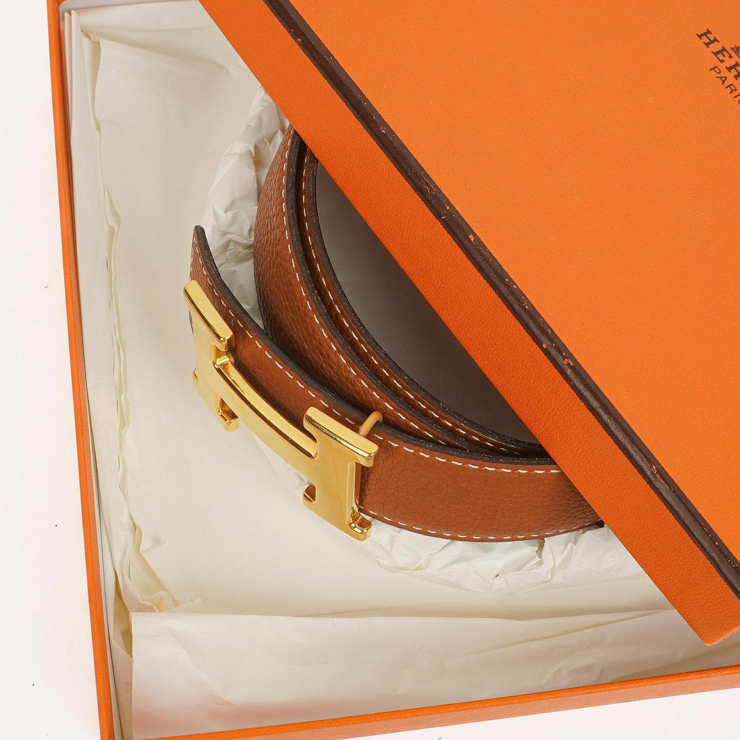 Hermès H Wendegürtel 85 aus Box- und Togo-Leder in Schwarz/Gold, 30 mm