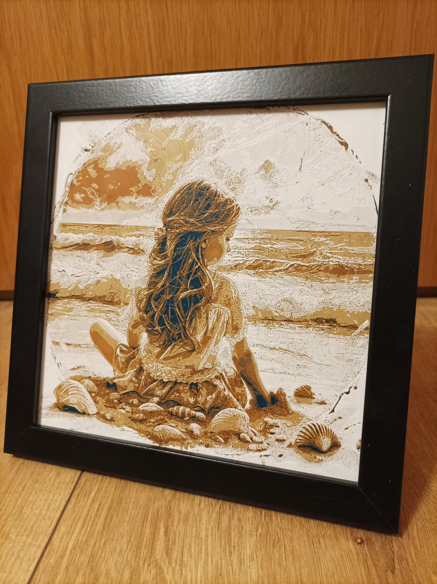 3D-printed wall mural "Girl on the Beach" with frame, 22x22 cm
