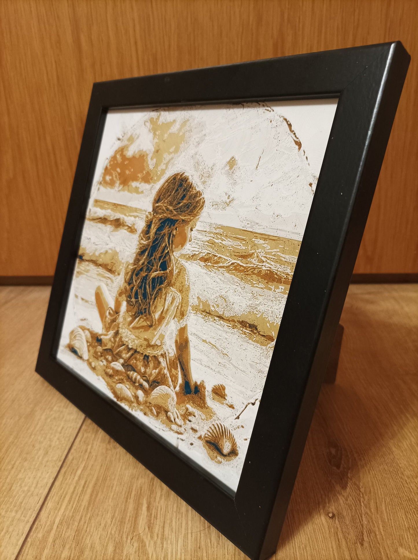 3D-printed wall mural "Girl on the Beach" with frame, 22x22 cm