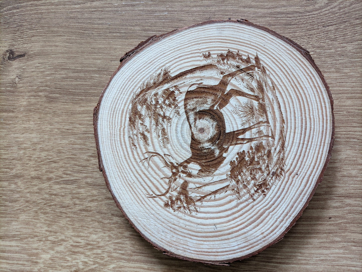 Natural wood coasters with artistic engravings
