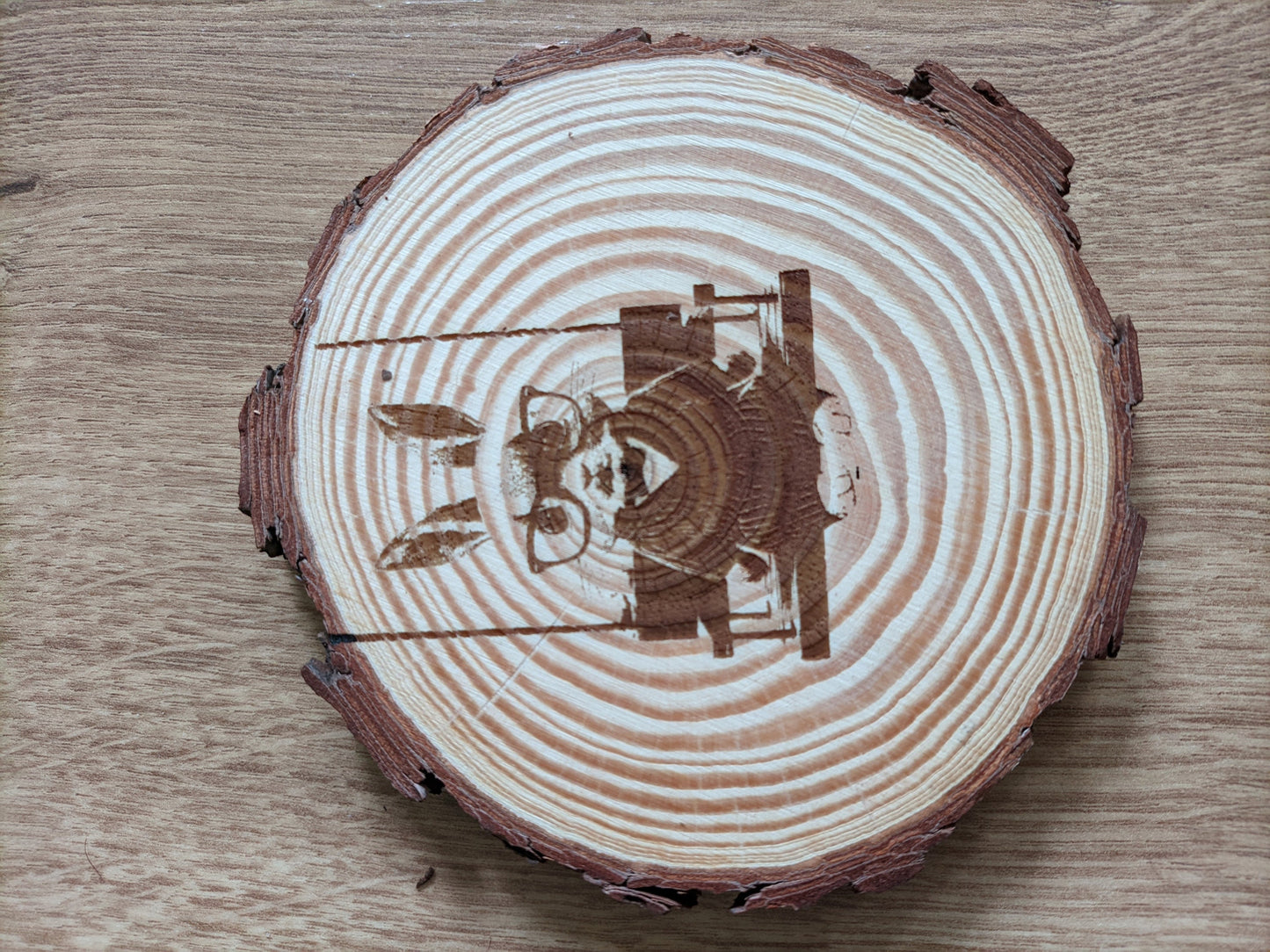 Natural wood coasters with artistic engravings