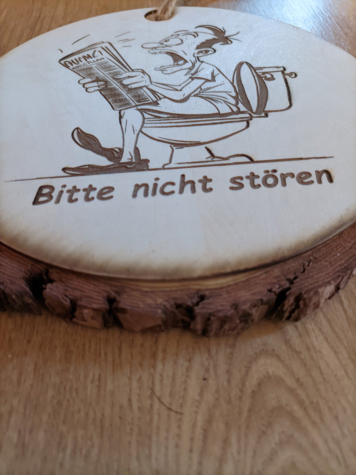 Humorous wooden toilet sign