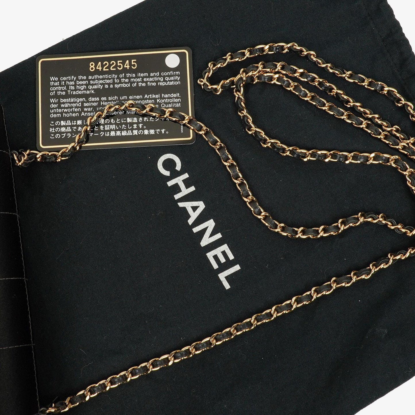 Chanel Chocolate Bar rechteckige Mini Flap Tasche aus schwarzem gestepptem Satin