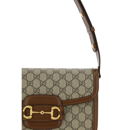 Beżowa torebka na ramię Gucci z polietylenu – elegancka torba na ramię z aplikacją Horsebit
