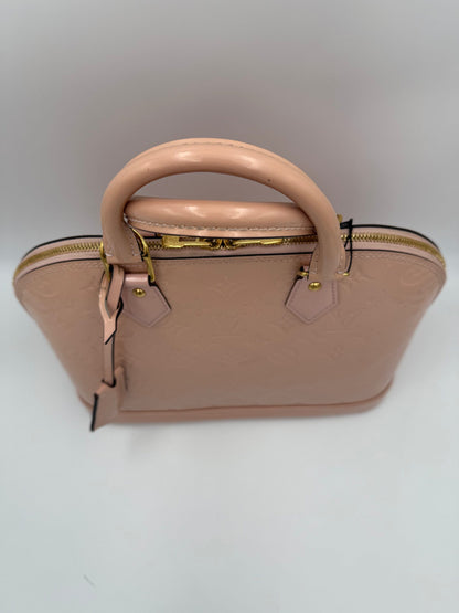 Louis Vuitton Alma MM Handtasche aus pinkem Lackleder