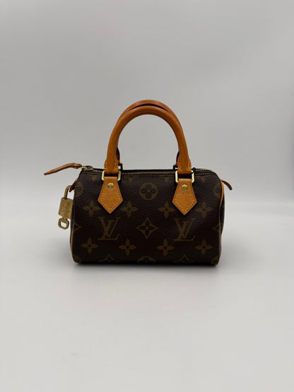 LOUIS VUITTON Nano Speedy Monogram Handtasche