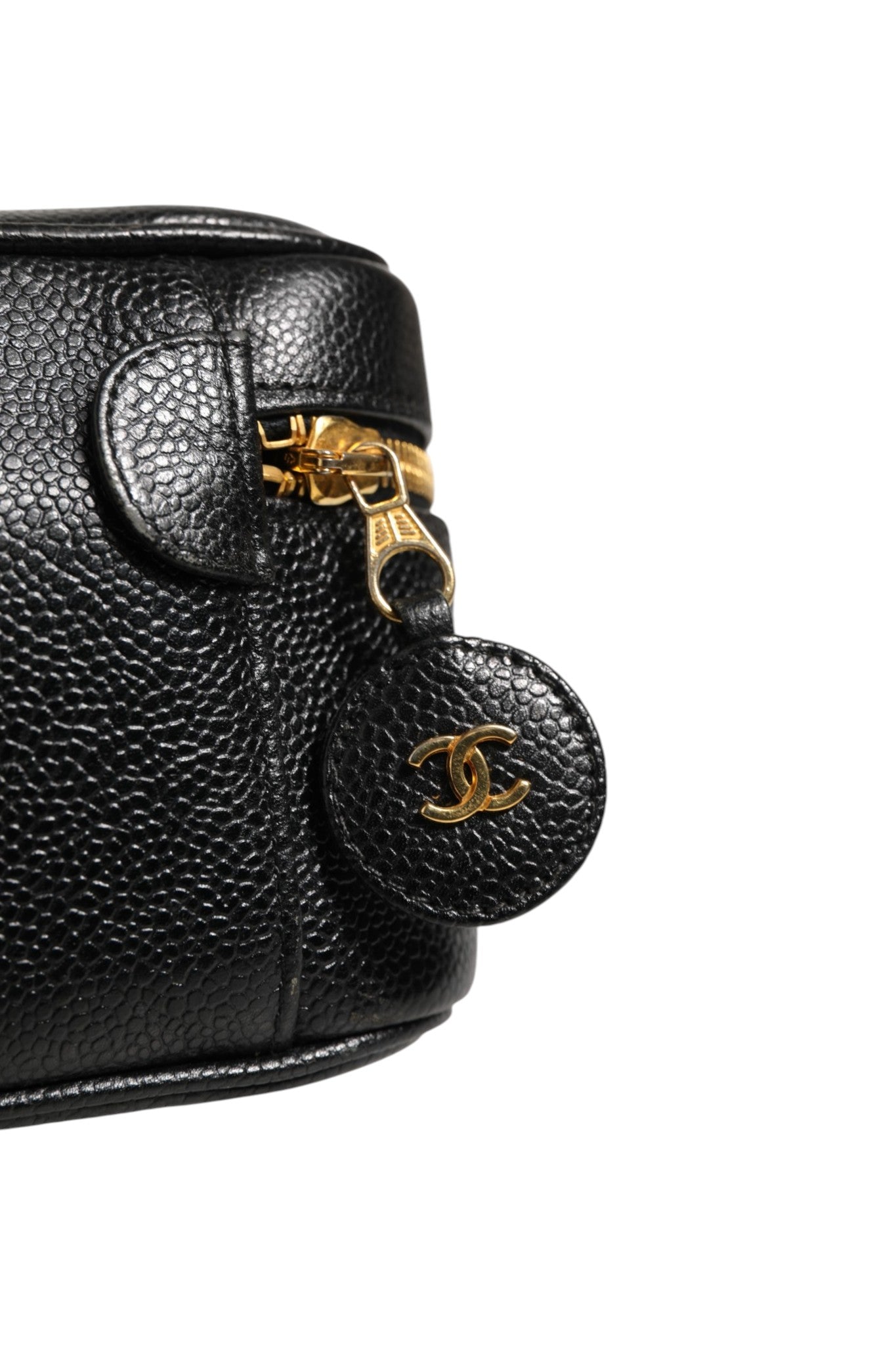 Schwarze und goldene Kosmetiktasche