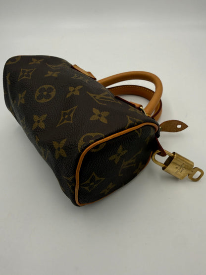 LOUIS VUITTON Nano Speedy Monogram Handtasche