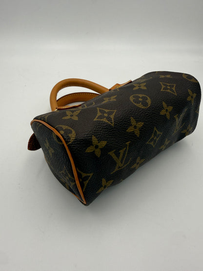 LOUIS VUITTON Nano Speedy Monogram Handtasche