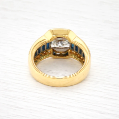 Atemberaubender Luxus: 750 Gelbgold Ring mit großem Princess Diamant & tiefblauen Saphiren