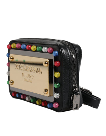 Dolce & Gabbana Czarna skórzana kopertówka z paskiem na nadgarstek z logo LED – elegancja na każdą okazję