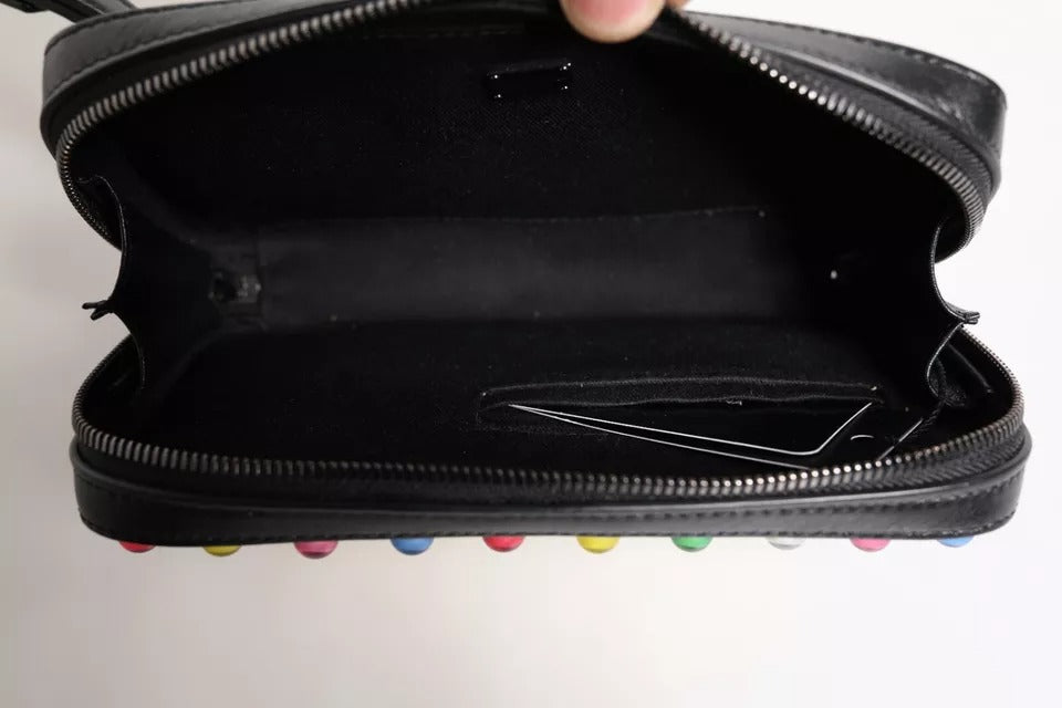 Dolce & Gabbana Czarna skórzana kopertówka z paskiem na nadgarstek z logo LED – elegancja na każdą okazję