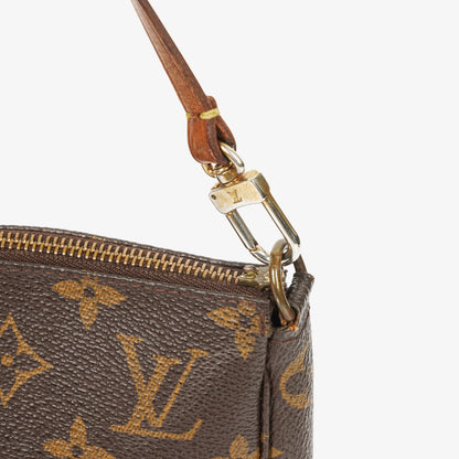 Louis Vuitton Pochette Accessoires Clutch aus Monogram Canvas
