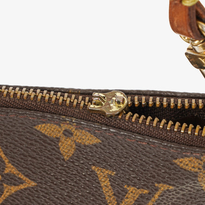 Louis Vuitton Pochette Accessoires Clutch aus Monogram Canvas