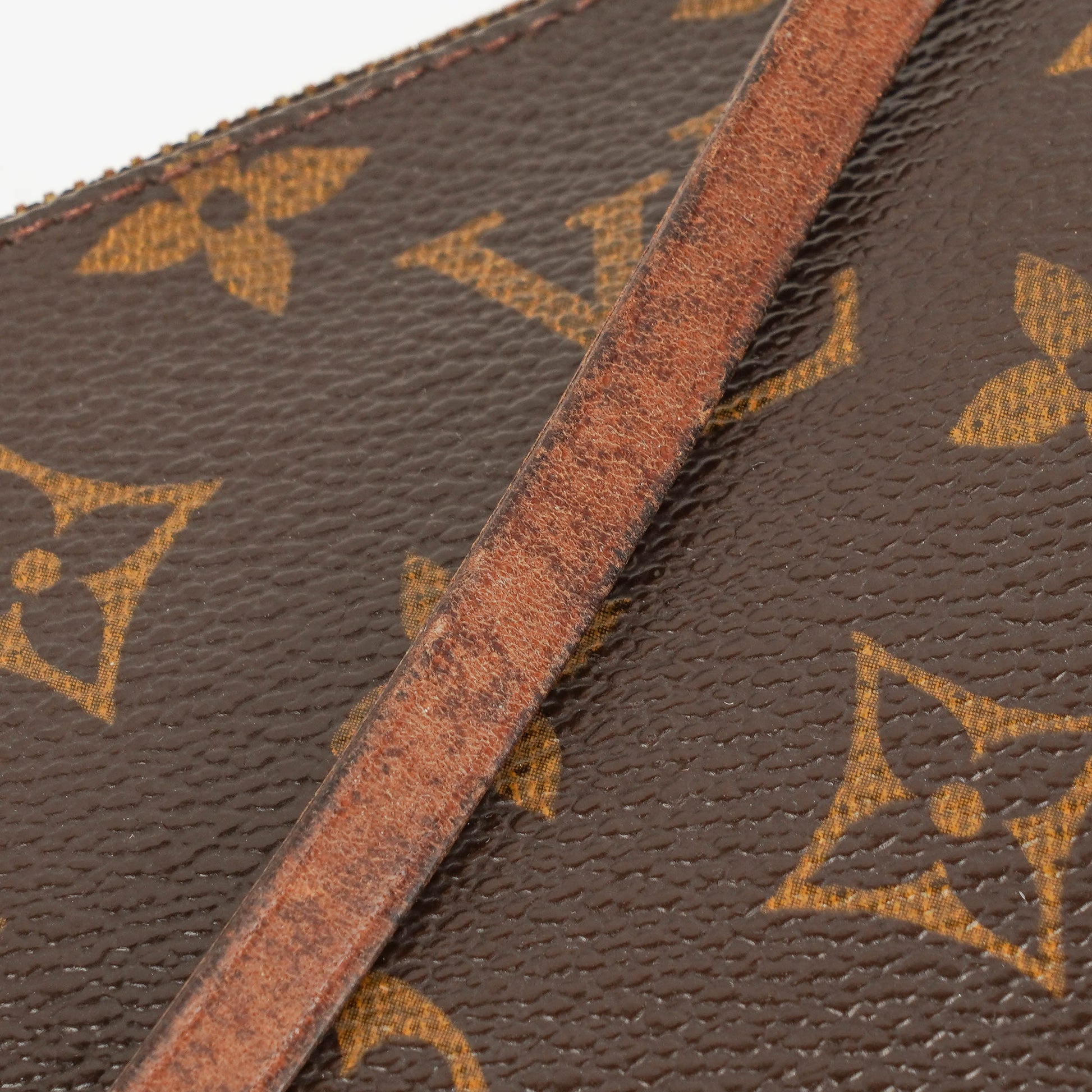 Louis Vuitton Pochette Accessoires Clutch aus Monogram Canvas