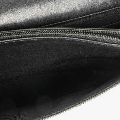 Chanel Wallet on Chain aus schwarzem gestepptem Lackleder