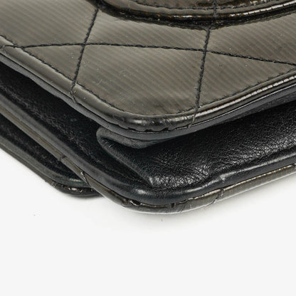 Chanel Wallet on Chain aus schwarzem gestepptem Lackleder