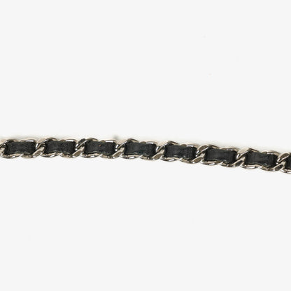 Chanel Wallet on Chain aus schwarzem gestepptem Lackleder