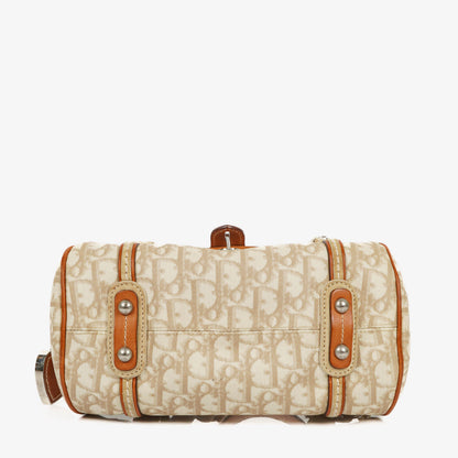 Christian Dior Romantique Trotter Monogramm Tasche aus beschichtetem Canvas in Tan