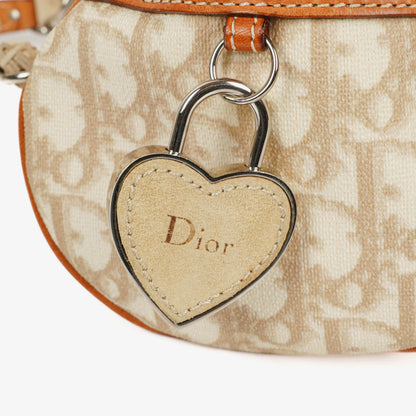 Christian Dior Romantique Trotter Monogramm Tasche aus beschichtetem Canvas in Tan