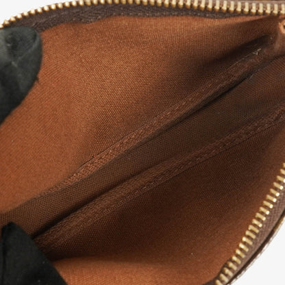 Louis Vuitton Mini Pochette Accessoires Clutch aus Monogram Canvas