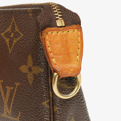 Louis Vuitton Mini Pochette Accessoires Clutch aus Monogram Canvas