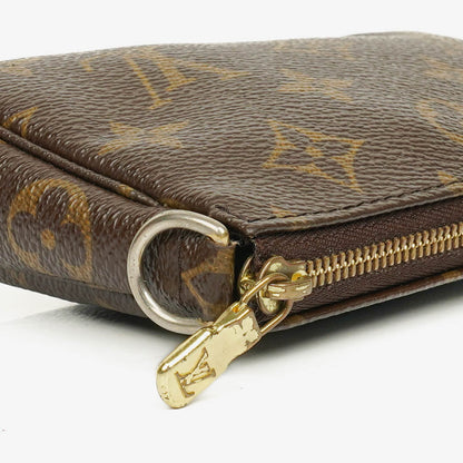 Louis Vuitton Mini Pochette Accessoires Clutch aus Monogram Canvas
