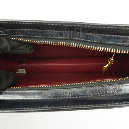 Chanel CC Handgelenktasche aus schwarzem Lackleder mit 24K Goldbeschlägen