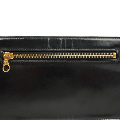 Chanel CC Handgelenktasche aus schwarzem Lackleder mit 24K Goldbeschlägen