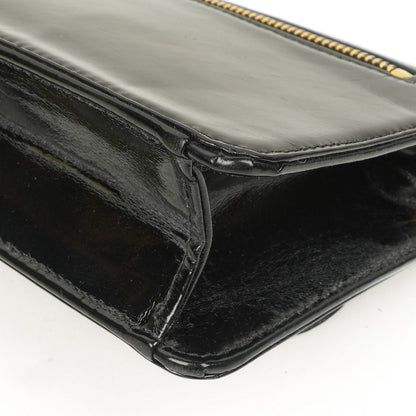 Chanel CC Handgelenktasche aus schwarzem Lackleder mit 24K Goldbeschlägen