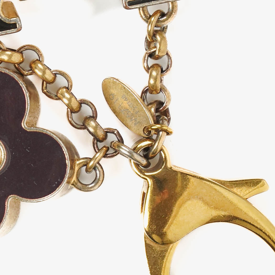 Louis Vuitton Fleur de Monogram Taschenanhänger und Schlüsselanhänger mit Mini-Reiseschlüsselhalter