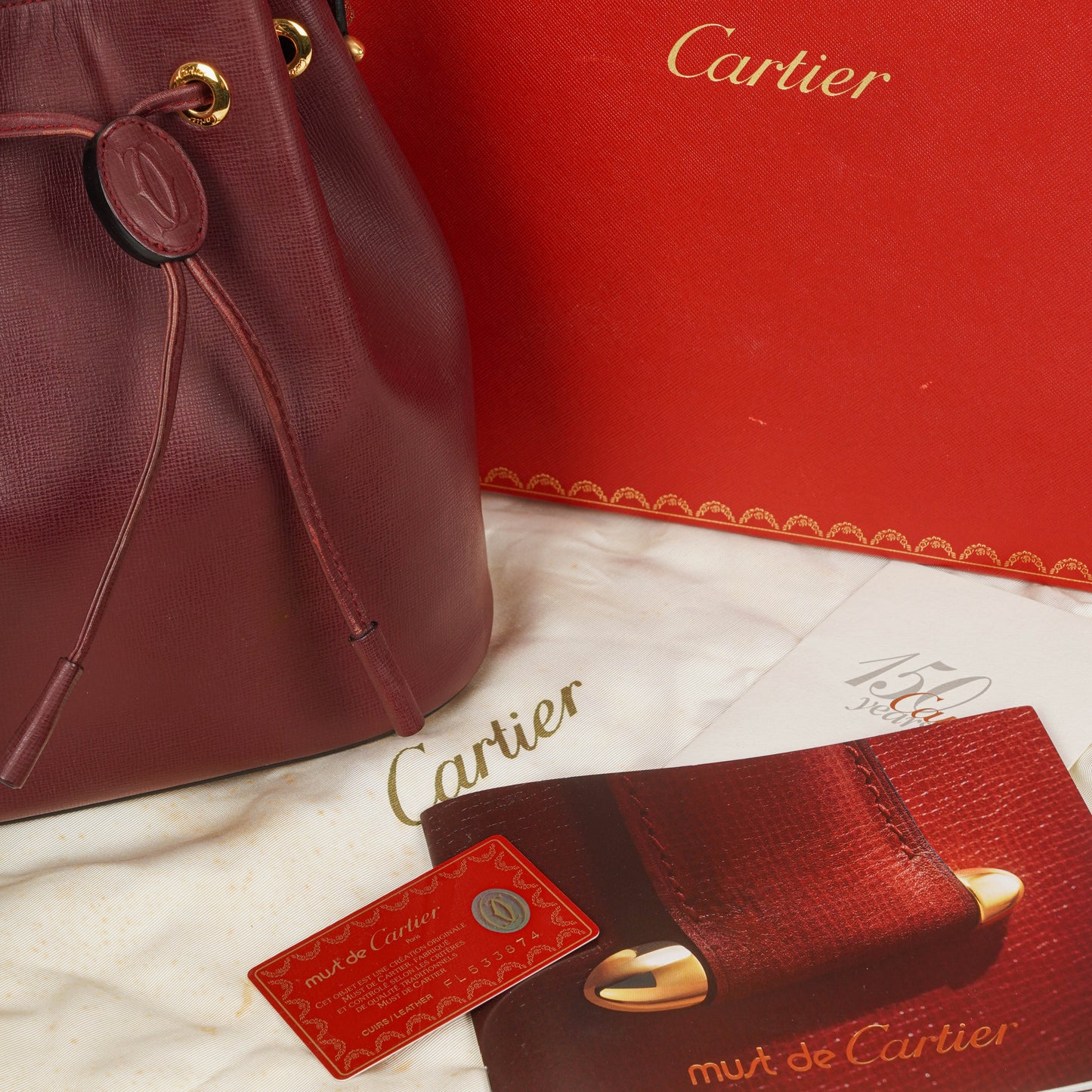 Cartier Must de Cartier Escarcelle Tasche aus burgunderrotem Leder
