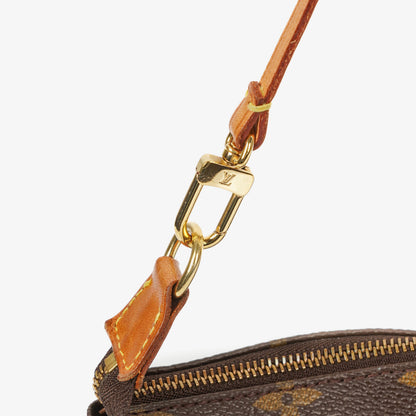 Louis Vuitton Pochette Accessoires Monogram Canvas Clutch Handtasche