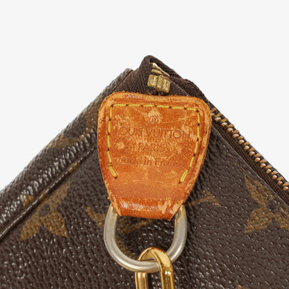 Louis Vuitton Pochette Accessoires Clutch aus Monogram Canvas