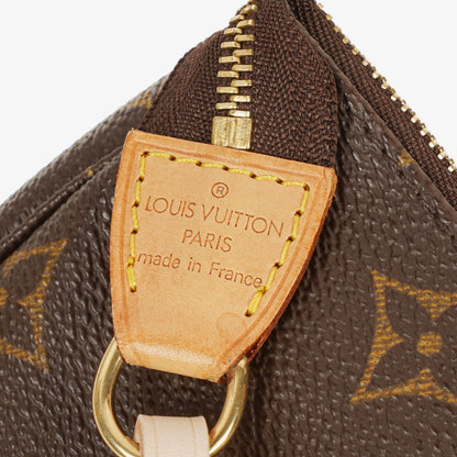 Louis Vuitton Pochette Accessoires Clutch aus Monogram Canvas