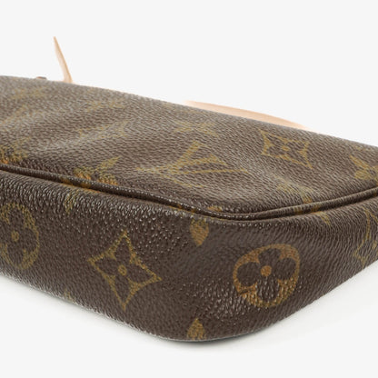 Louis Vuitton Pochette Accessoires Clutch aus Monogram Canvas