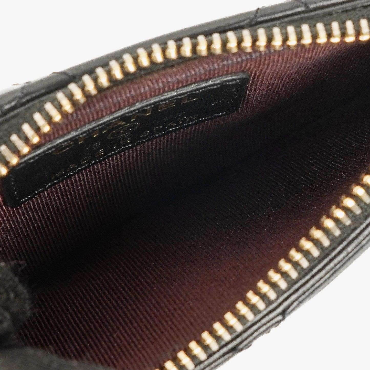 Chanel Münzgeldbörse aus schwarzem gestepptem Leder