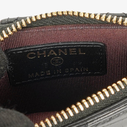 Chanel Münzgeldbörse aus schwarzem gestepptem Leder