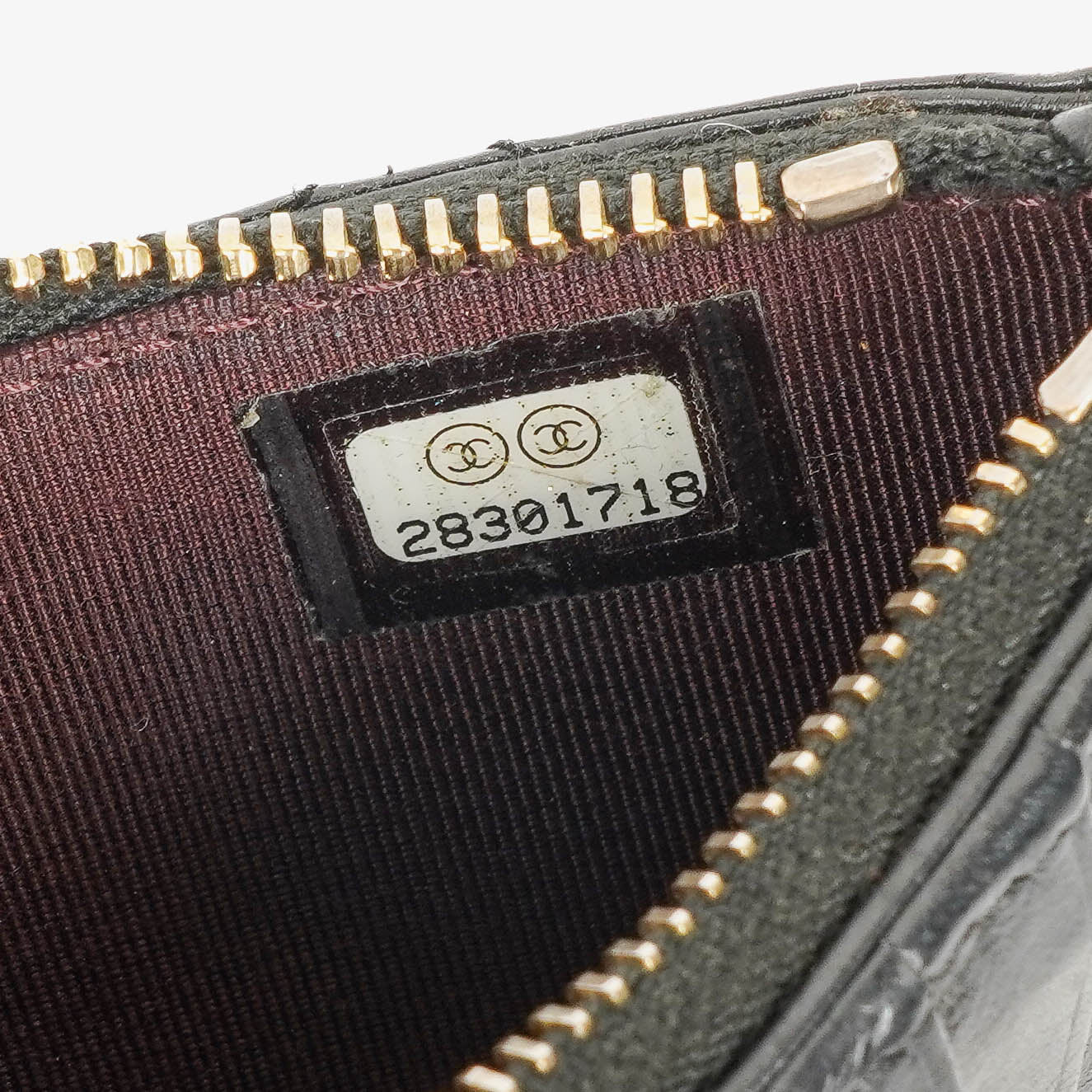 Chanel Münzgeldbörse aus schwarzem gestepptem Leder