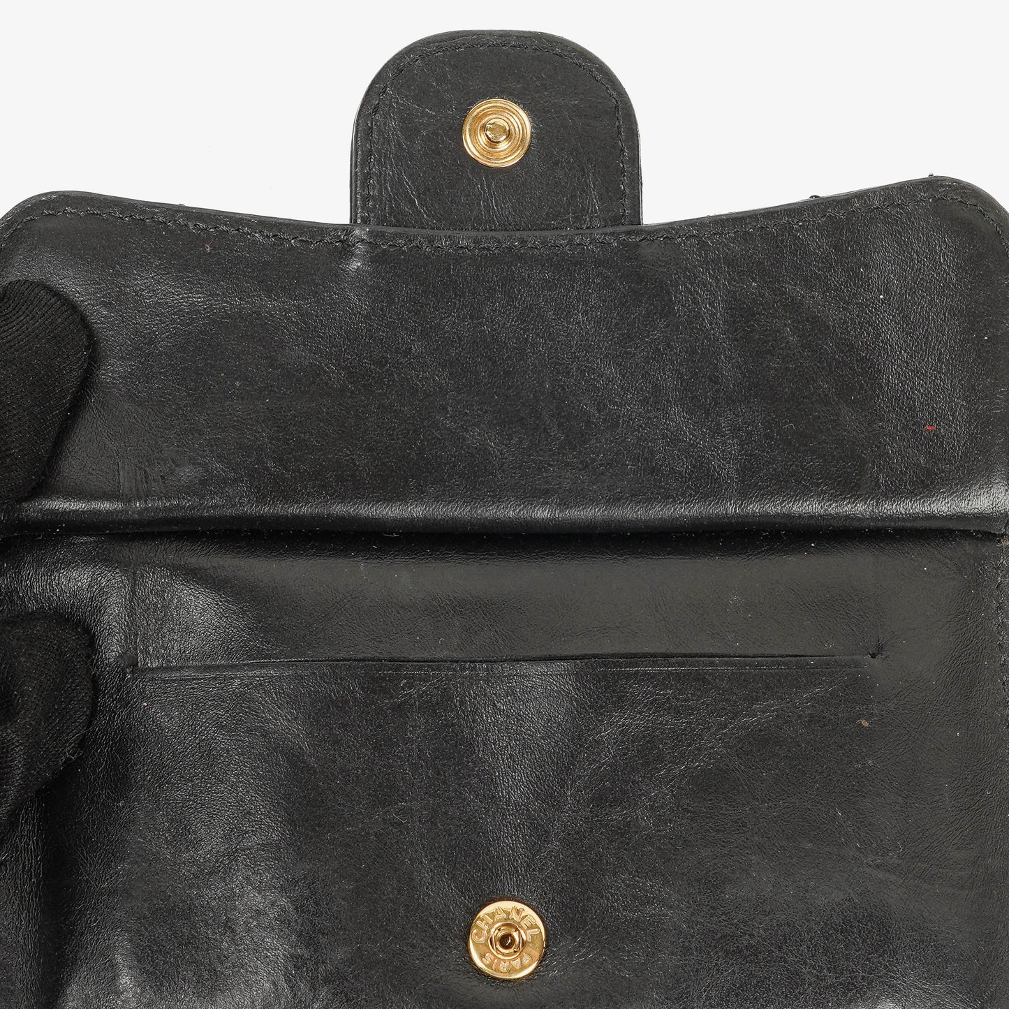 Chanel Münzgeldbörse aus schwarzem gestepptem Leder