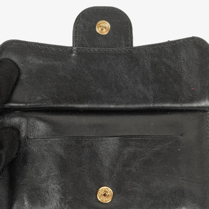 Chanel Münzgeldbörse aus schwarzem gestepptem Leder