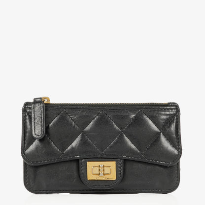 Chanel Münzgeldbörse aus schwarzem gestepptem Leder