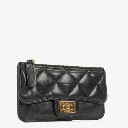 Chanel Münzgeldbörse aus schwarzem gestepptem Leder