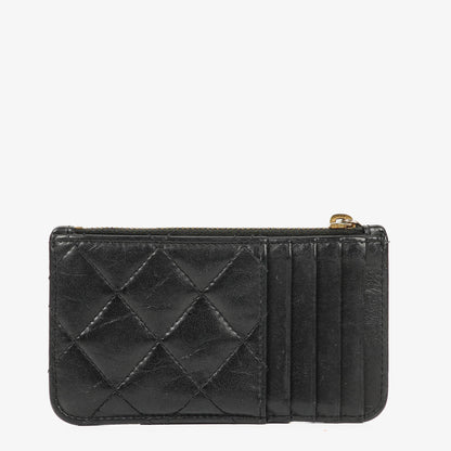 Chanel Münzgeldbörse aus schwarzem gestepptem Leder