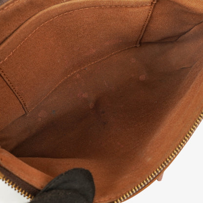 Louis Vuitton Riveting Limited Edition Pochette Accessories Clutch aus Monogram beschichtetem Canvas