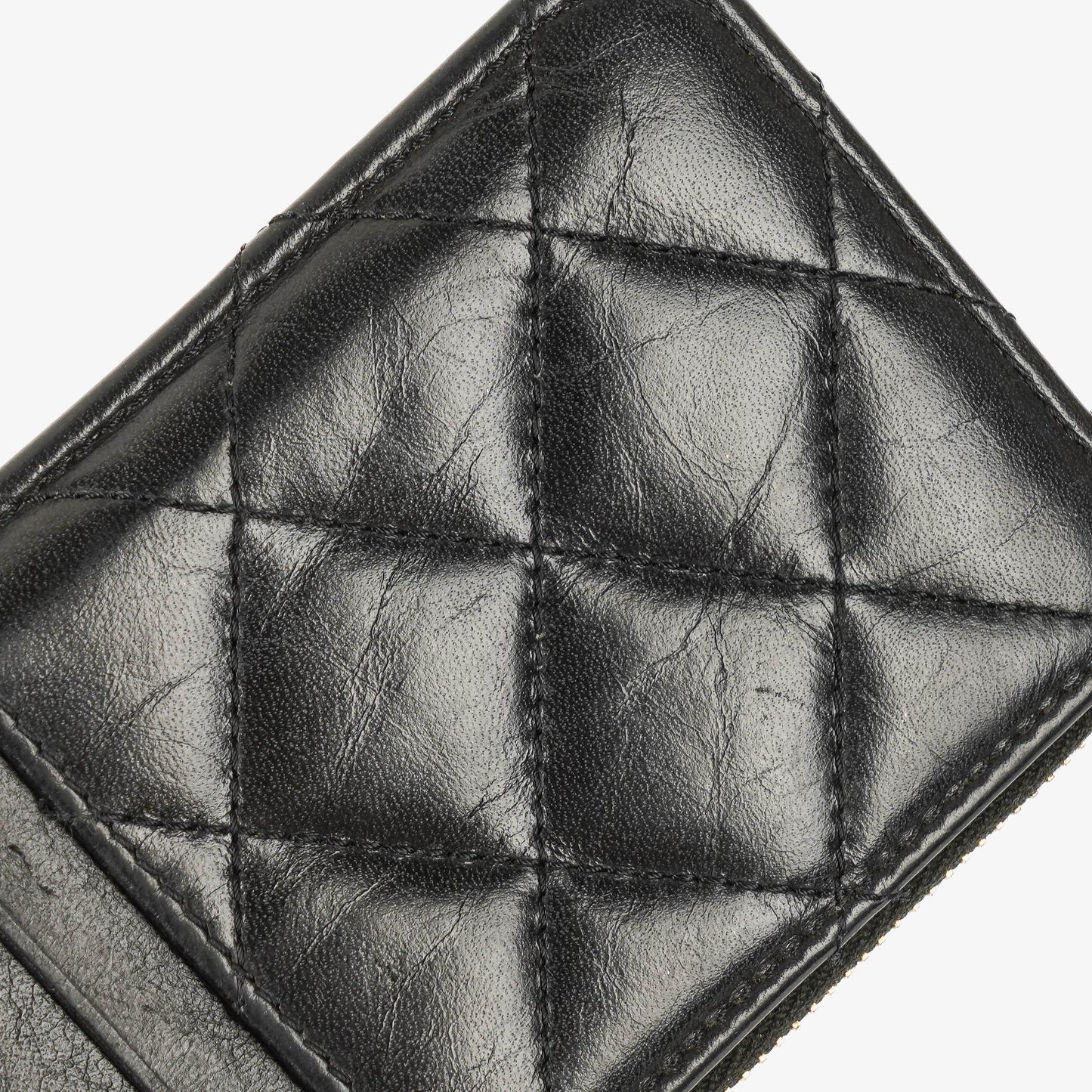 Chanel Münzgeldbörse aus schwarzem gestepptem Leder