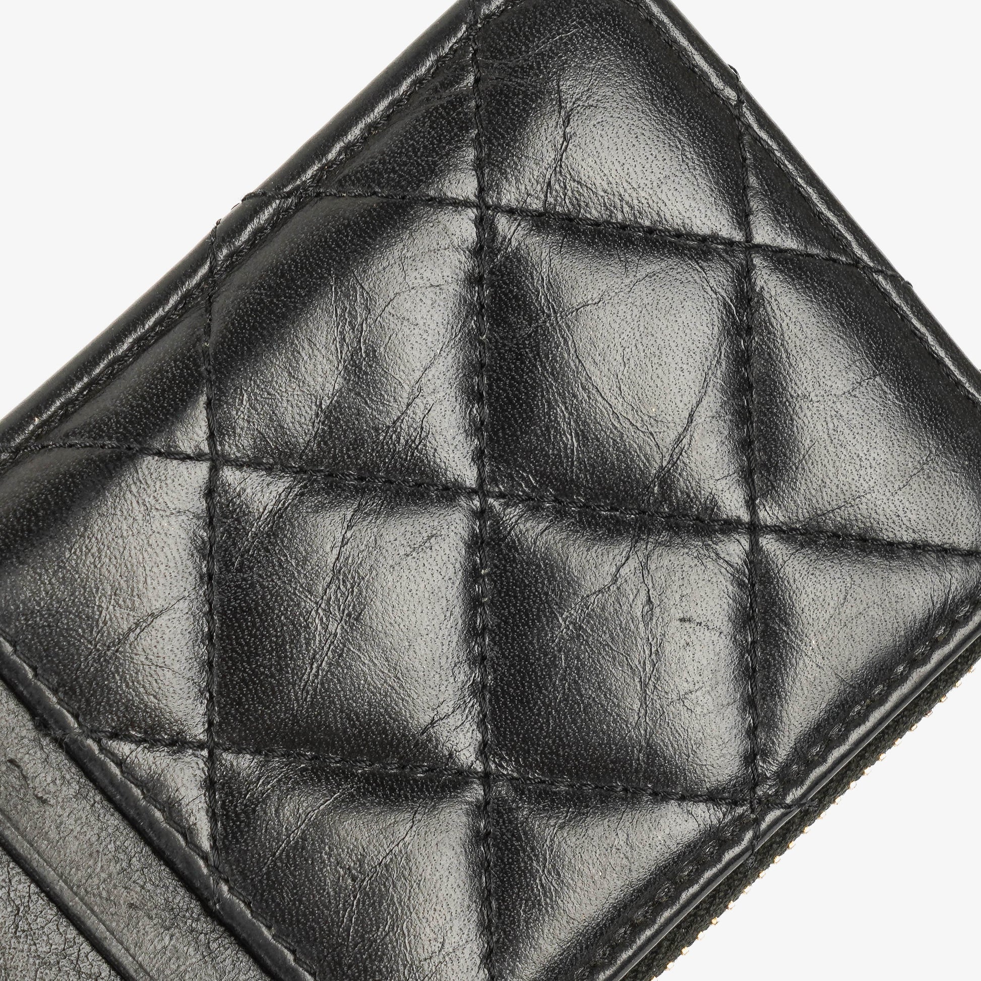 Chanel Münzgeldbörse aus schwarzem gestepptem Leder
