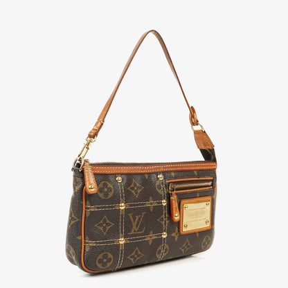 Louis Vuitton Riveting Limited Edition Pochette Accessories Clutch aus Monogram beschichtetem Canvas